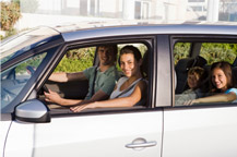 family in car